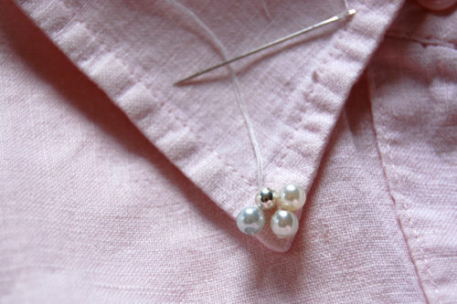 Learn how to embellish a shirt collar with pearls