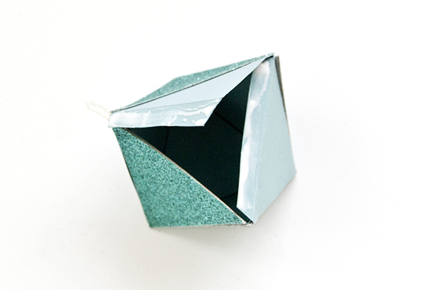 Learn how to make geometric paper ornaments, template included