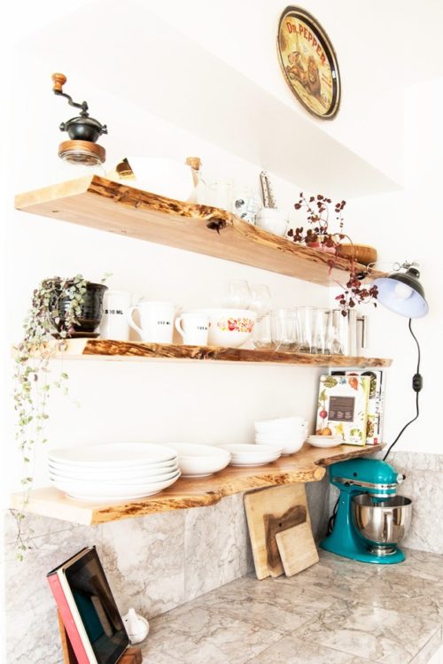 Kitchen makeover featuring floating, live-edge wood shelves