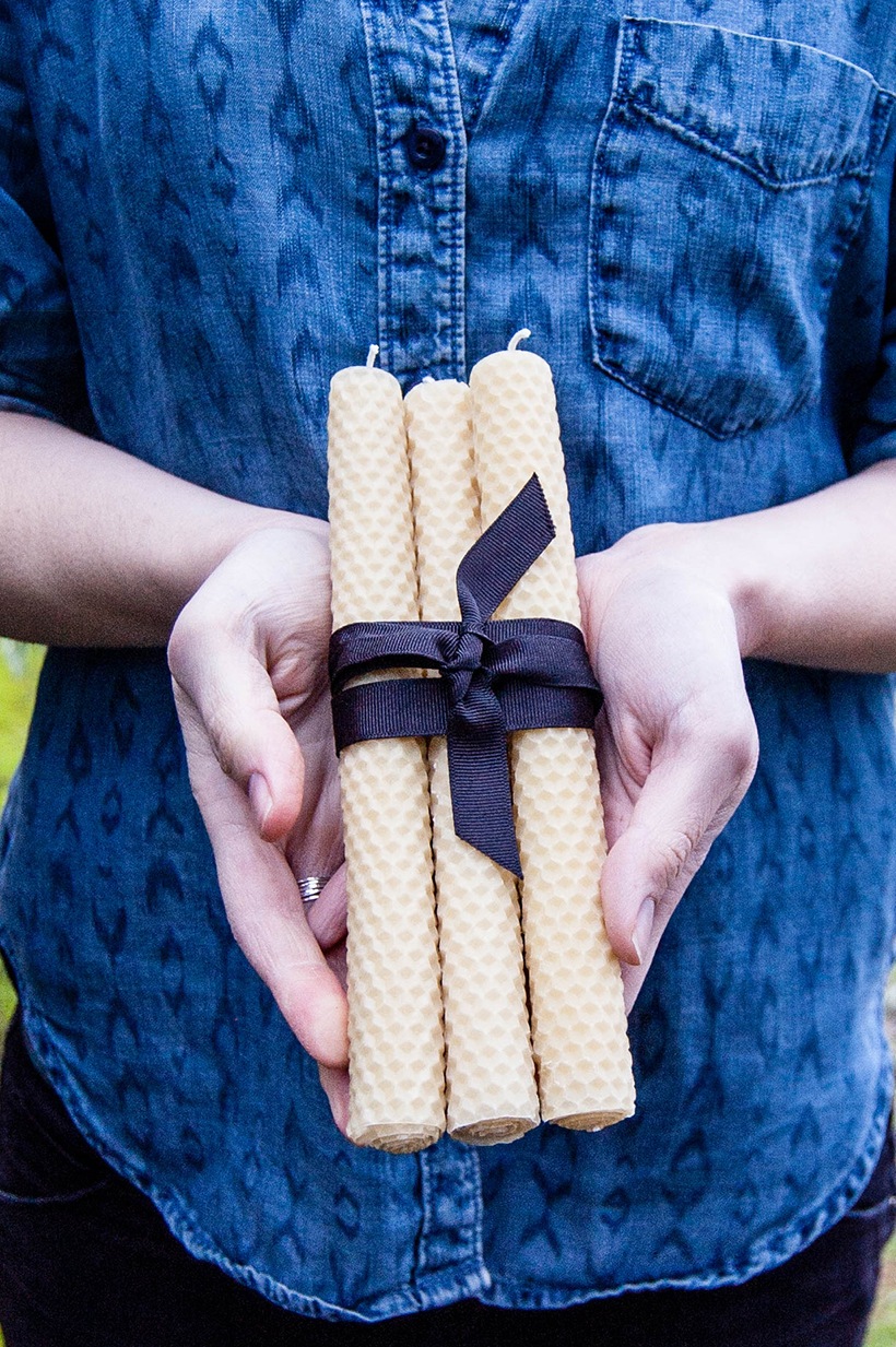These DIY beeswax taper candles would make a lovely holiday or hostess gift
