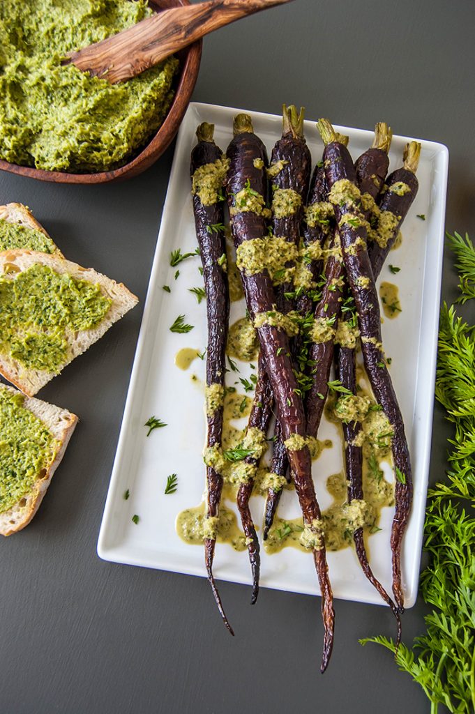 Roasted Carrots with Carrot Top and Garlic Scape Pesto - A great way to use produce you're not sure what to do with!