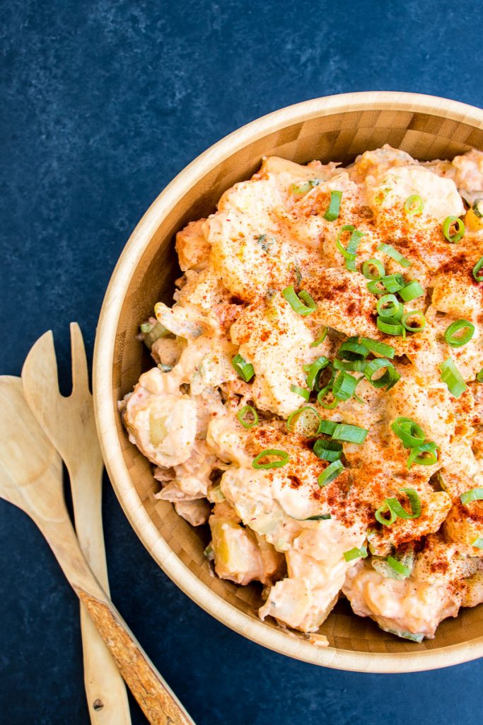 This spicy kimchi potato salad is a delicious twist on a traditional favorite #kimchi #kimchee #recipe