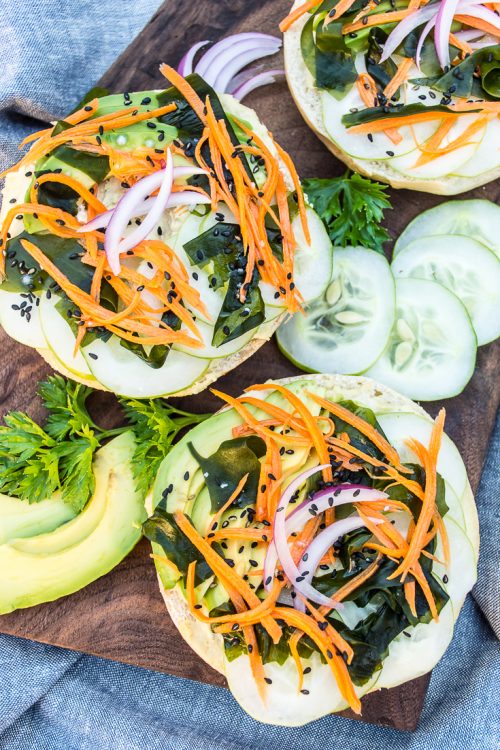 If a veggie sushi roll and a bagel got together and had a baby, it would be this veggie sushi bagel. Topped with wasabi cashew cream cheese, avocado, cucumber, seaweed, and pickled carrots, you get the flavors of sushi without the hassle. 