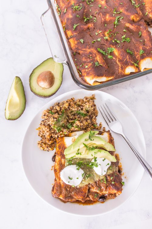 These vegan enchiladas are loaded with vegetables like beans, broccoli, peppers, and spinach, for a truly plant-based meal. 