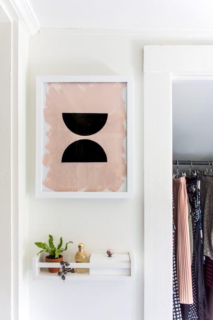Need to store jewelry, but don't want it all out in the open? Build your own secret jewelry storage hidden behind art! #DIY #decor #homedeor #art