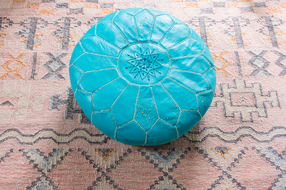 Scratched-up Moroccan leather pouf I'm going to re-cover